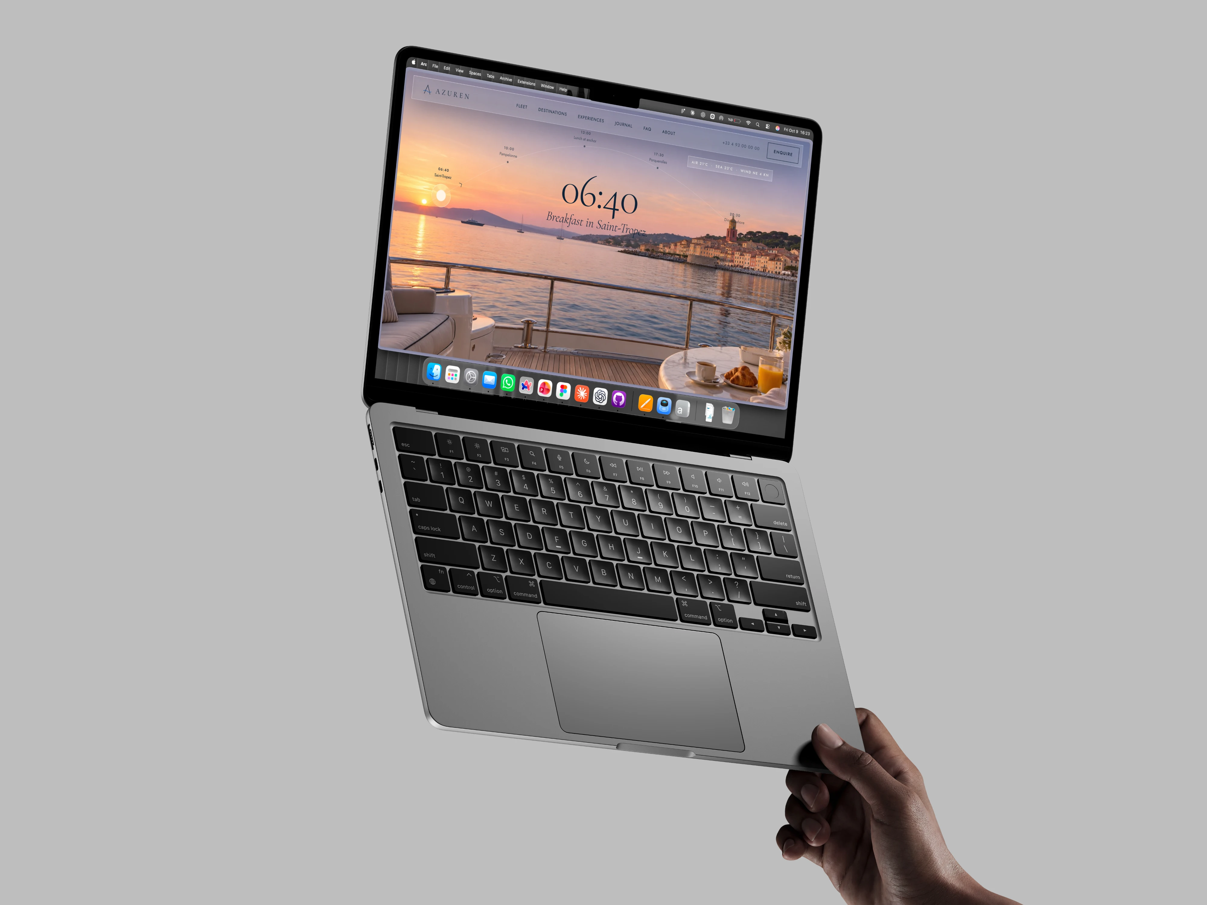 A laptop showing a website design